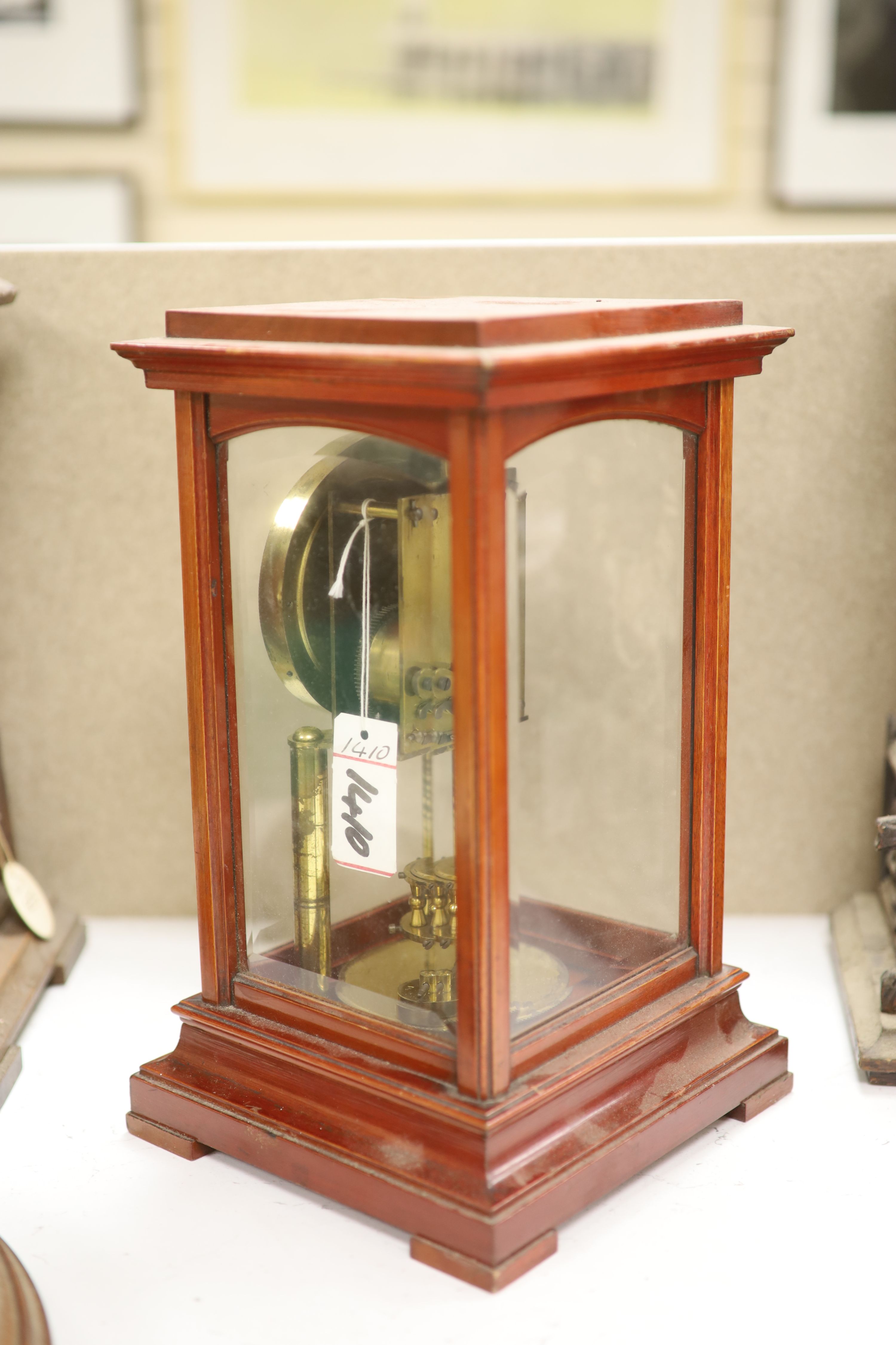 An early 20th century mahogany cased electric four glass mantel clock, height 31cm